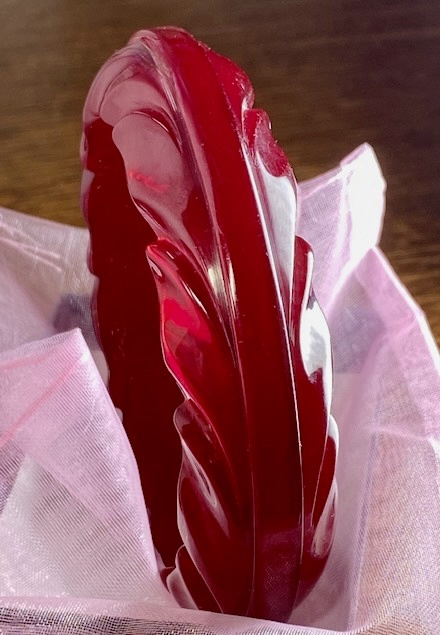 BB270 translucent cranberry leaf carved bakelite bangle